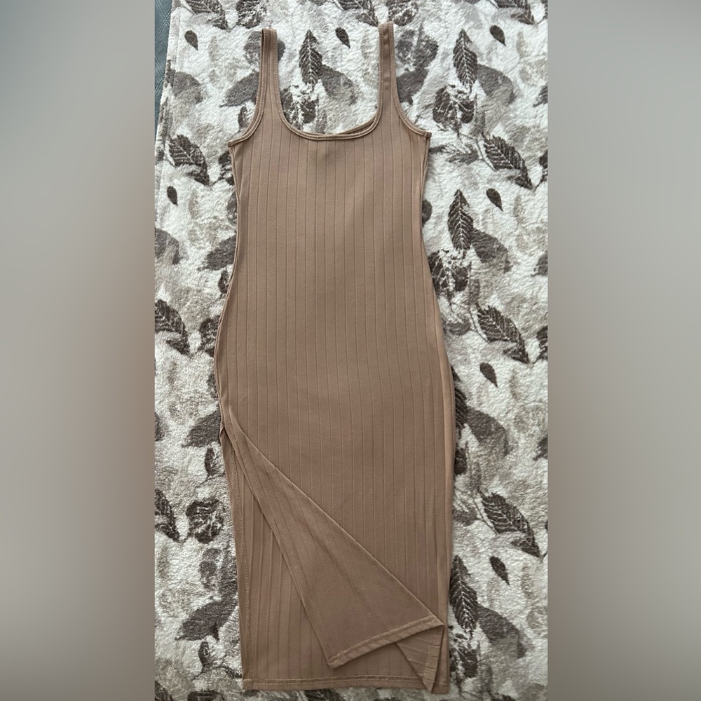Beige dress with a split
